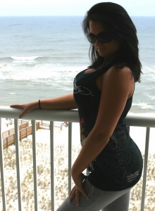 Brooke loves to take pictures of her huge tits almost falling out of her bikini top Picture 4